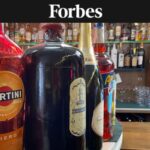 Assorted liquor bottles on the bar counter